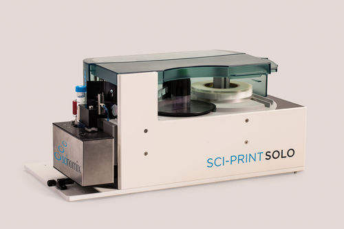 Этикетировочная машина для лабораторных трубок - Sci-Print SOLO - Scinomix, Inc - для флакона / для фармацевтической промышленности / полуавтоматическая