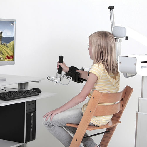 Система реабилитации рук - Armeo®Spring Pediatric - Hocoma  - подвижности запястий / роботизированная / педиатрическая